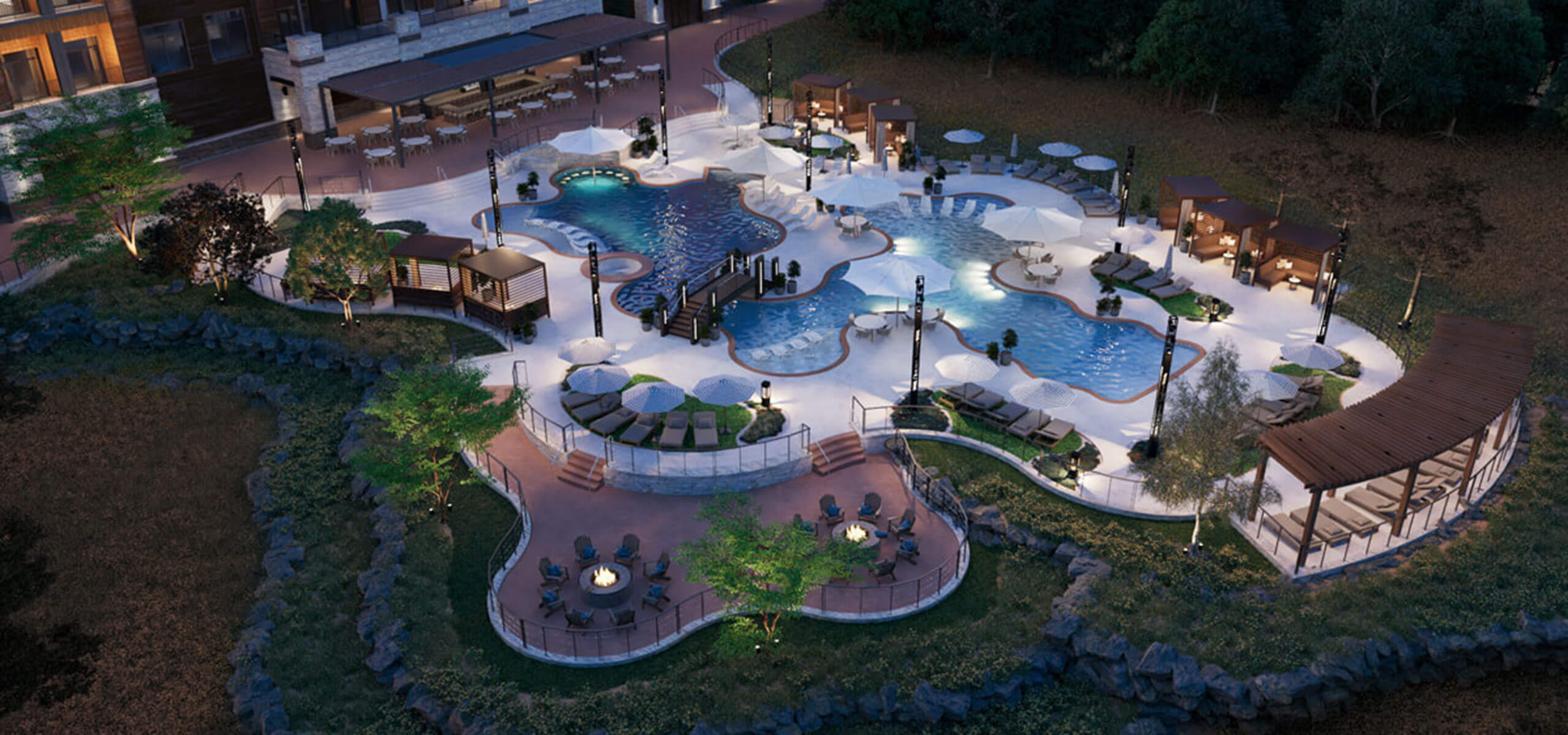 Choctaw Landing pool complex at dusk with lagoon-style pools, cabanas, fire pits, and a curved pergola.