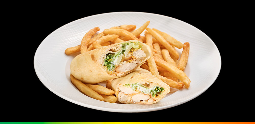 A chicken warp with fries